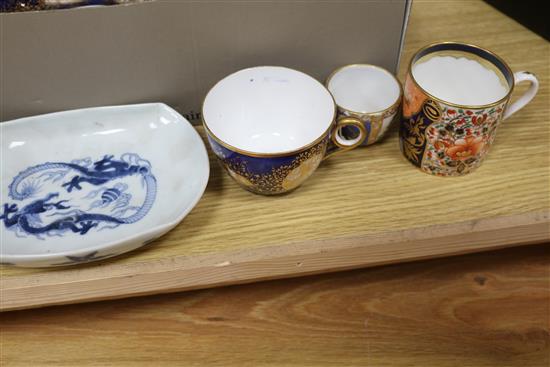 A quantity of assorted cups and saucers